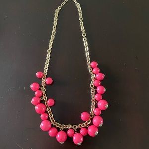 Gold necklace with pink beads
